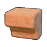 Carved light-brown rock figure
